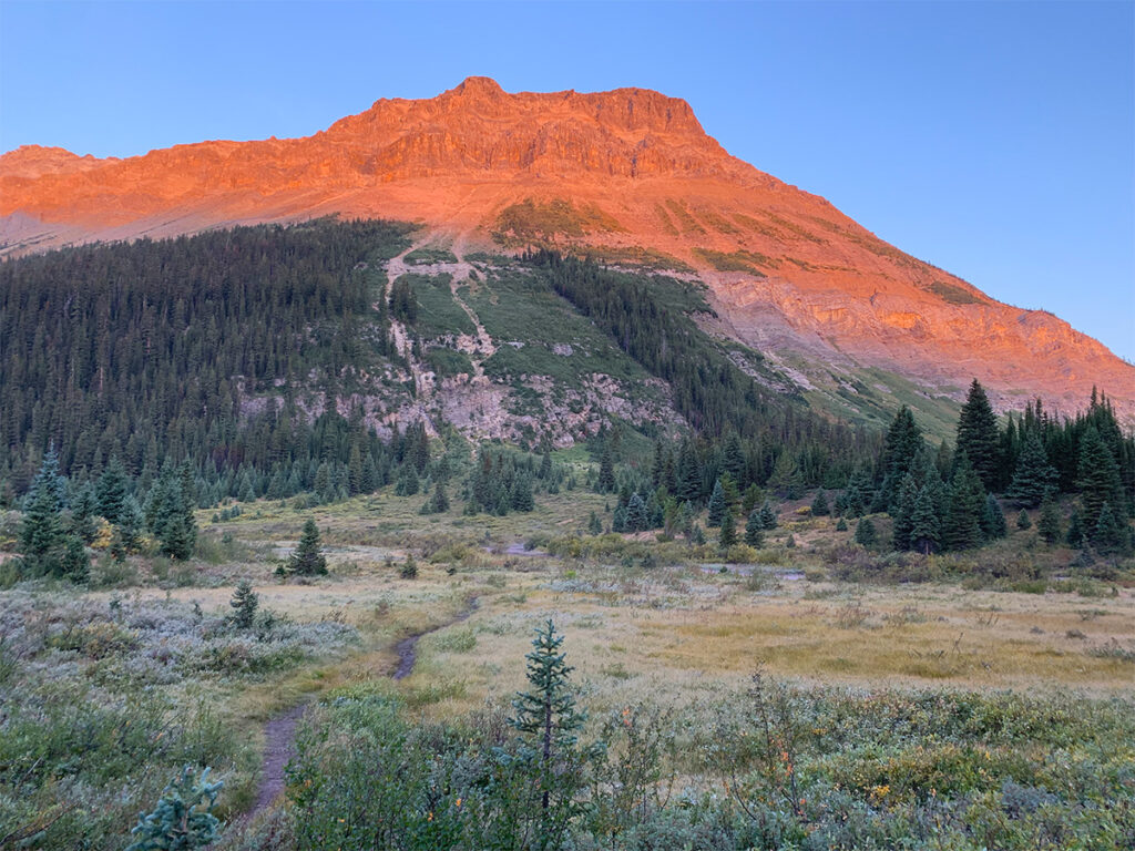 Sunrise on Skoki Loop hike during backcountry camping in Banff